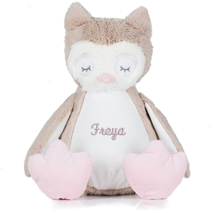 Light Brown coloured soft plush owl. Contrast pink nose and feet. Cream coloured panel on chest and under wings. Complies with EN71 European Toy Safety regulations. Remove all hang tags and their fasteners before giving these items to a child. Suitable for all ages.