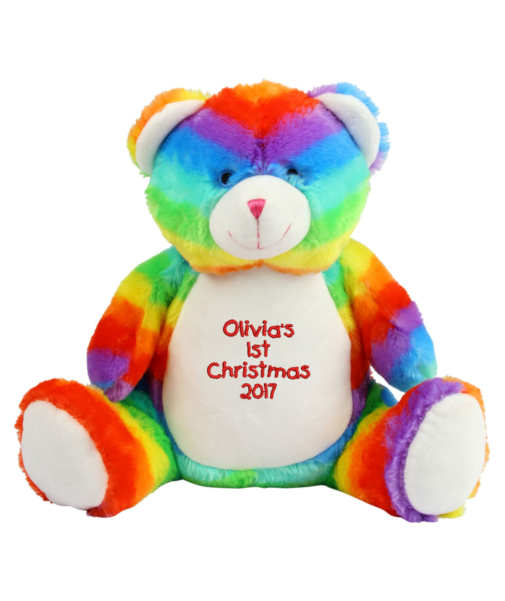 Multi-coloured soft plush bear. Contrast sewn nose and eyes. Cream coloured panel on tummy and feet. Complies with EN71 European Toy Safety regulations. Remove all hang tags and their fasteners before giving these items to a child. Suitable for all ages.